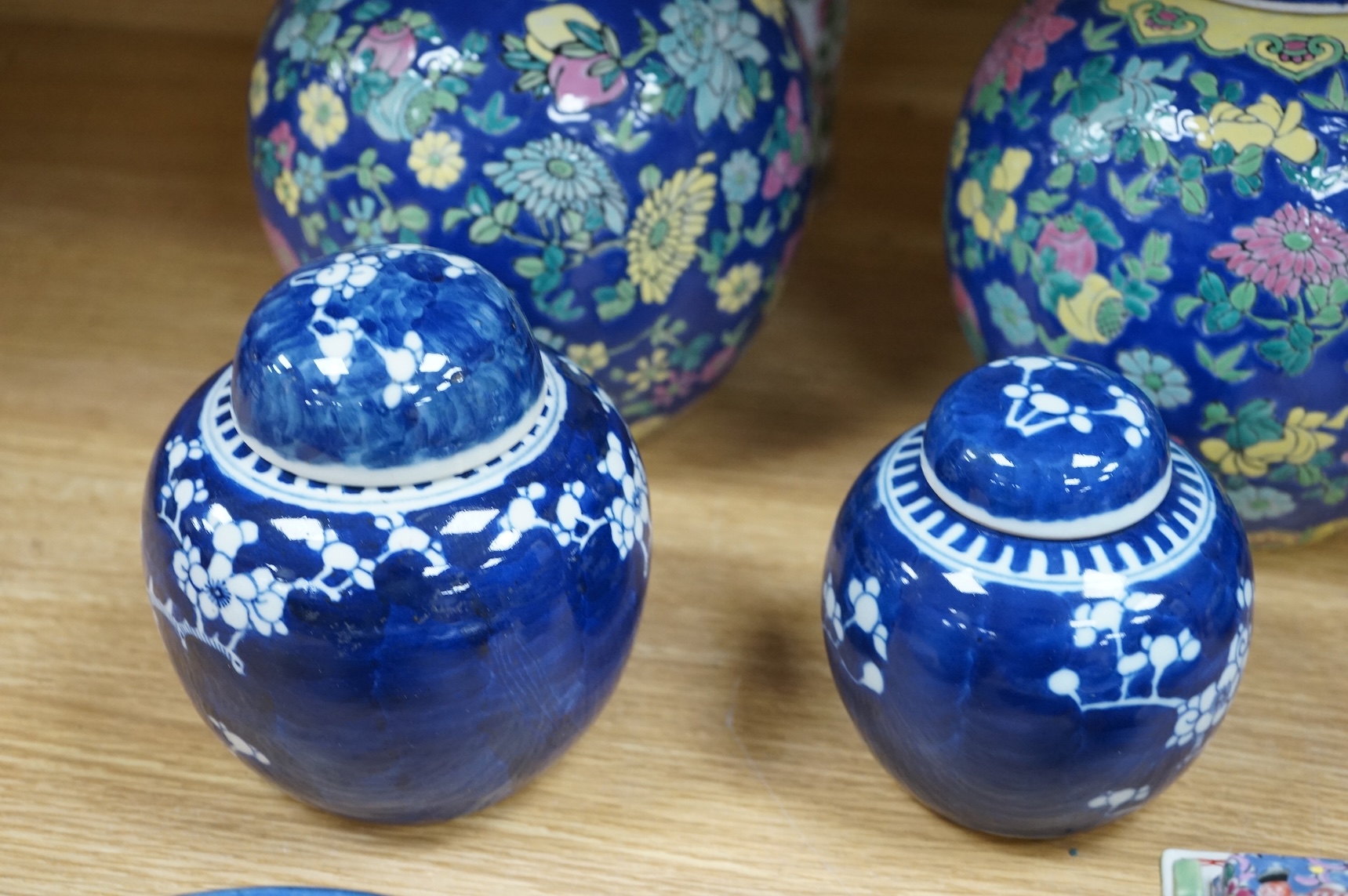Fourteen pieces of Chinese porcelain and pottery, 19th/20th century to include a pair of blue and white ginger jars, famille rose cup and saucer and a cloisonné pot and cover in the form of an apple, largest 27cm high